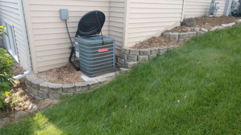 ideas for a sloped yard C.R. Property Maintenance